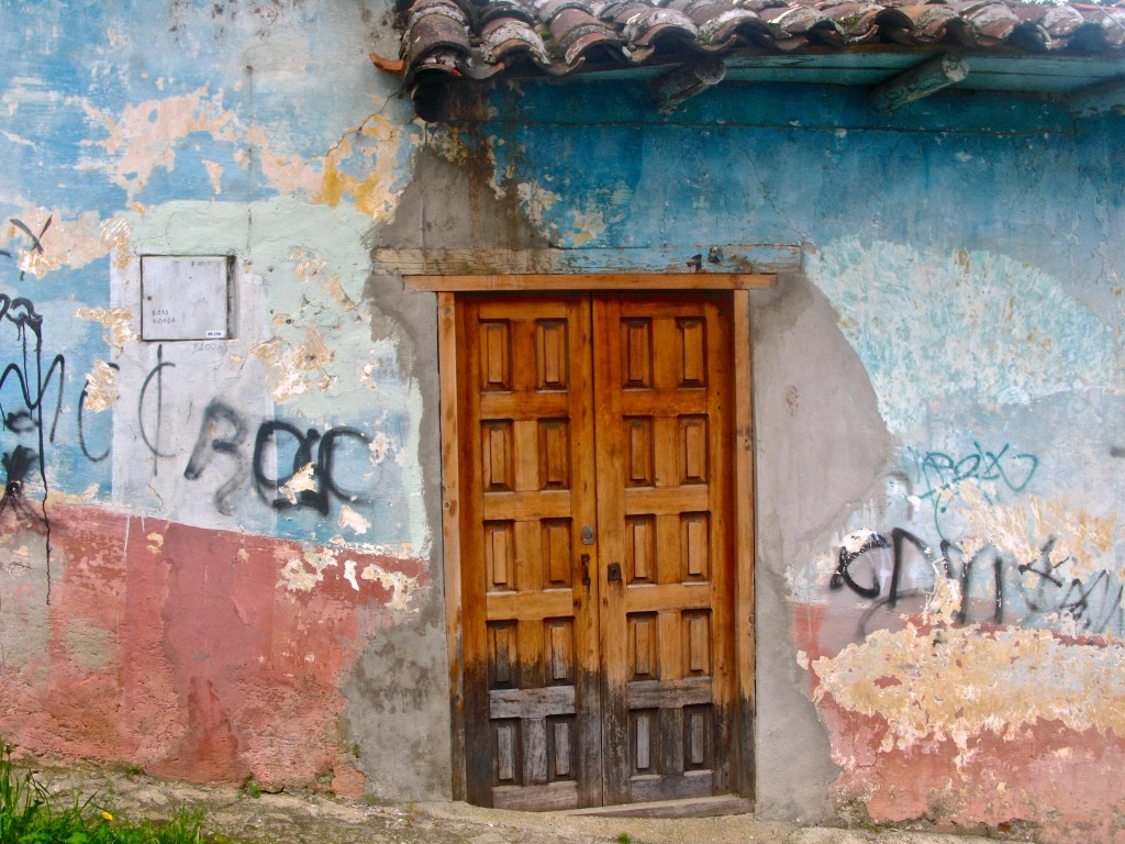 A wall and door with dynamic colors, showing the effect of decay gives an opportunity to see things differently. (image © Eva Boynton).