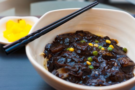 Korean Food Jajangmyeon Bowl, eaten around Valentine's Day to mourn being single, part of the cultural traditions in Korea. (Image © Pius99/iStock.)