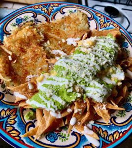 Homemade chilaquiles in Los Angeles, California suggests one way a family under lockdown in a pandemic preserves a cultural tradition. (Image © James Roddy)