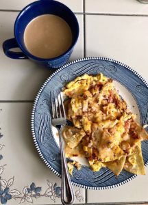 A breakfast of chilaquiles in Oakland, California symbolizes a family’s way of connecting to cultural traditions, even during lockdown in a pandemic. (Image © Elizabeth A. Roddy)s